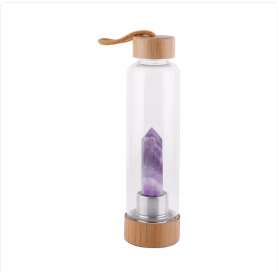 Crystal Bamboo Water BottleElevate your hydration ritual with our Crystal Bamboo Water Bottle. Crafted from durable glass and paired with a genuine healing crystal, this bottle is as beautifulWater BottleBeauty Babeez Fits LLCBeauty Babeez Fits LLCCrystal Bamboo Water Bottle