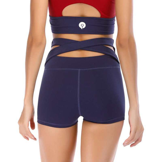 Women wearing high waist seamless yoga shorts in various colors for workout and casual wear