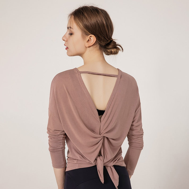 Women's Long Sleeve Breathable Workout T-ShirtWork out in style. This long-sleeve athletic top features a trendy open-back design and is crafted from premium Modal fabric for exceptional softness, breathability,Activewear TopBeauty Babeez FitsBeauty Babeez Fits LLCWomen's Long Sleeve