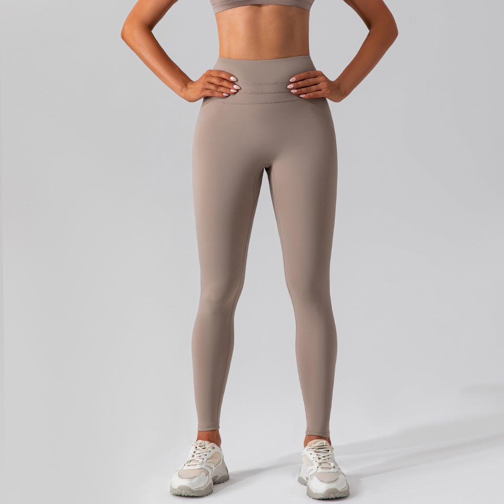 High Waist Nude Feel Yoga Quick-Drying Workout PantsFeel nothing, look everything. These high-waist yoga pants are crafted from a Lycra/Nylon blend with a nude-feel finish — so lightweight and second-skin smooth, you’LeggingsBeauty Babeez FitsBeauty Babeez Fits LLCHigh Waist Nude Feel