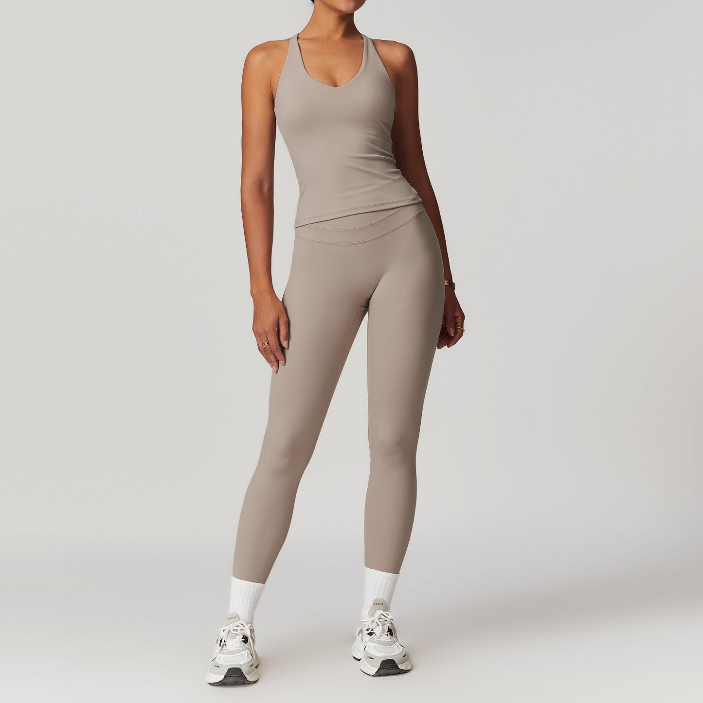 High-waist yoga suit two-piece set with moisture-wicking fabric and tummy control leggings