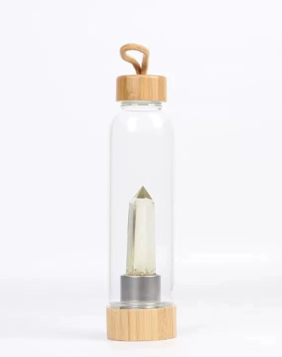 Crystal Bamboo Water BottleElevate your hydration ritual with our Crystal Bamboo Water Bottle. Crafted from durable glass and paired with a genuine healing crystal, this bottle is as beautifulWater BottleBeauty Babeez Fits LLCBeauty Babeez Fits LLCCrystal Bamboo Water Bottle