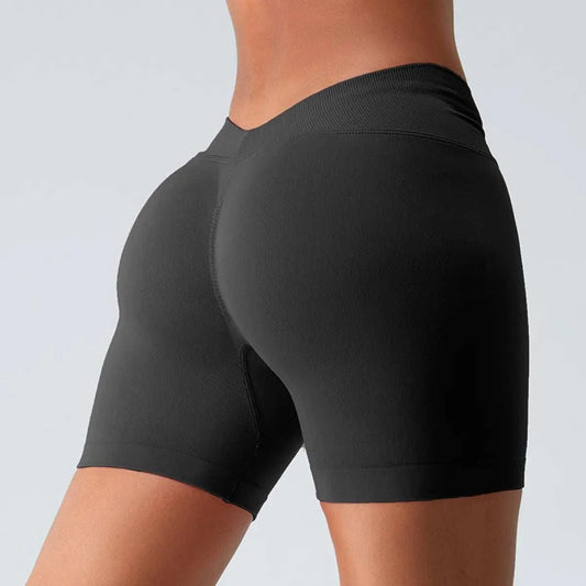 Seamless hip-raise yoga shorts sculpting tight-fit activewear for women in multiple colors