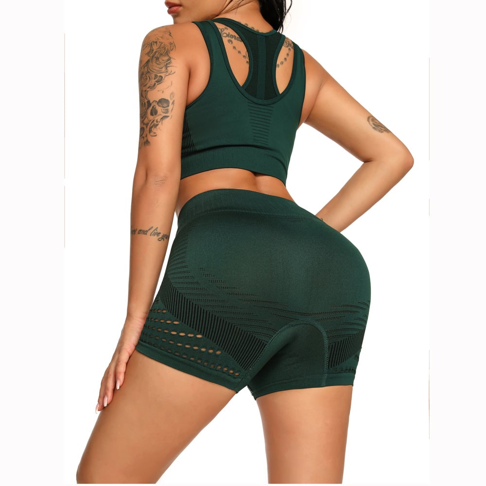 Women wearing seamless yoga shorts with hip-lift design in black gray color