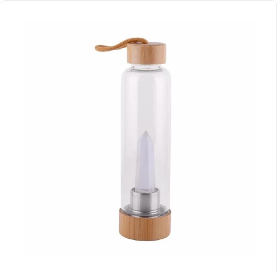 Crystal Bamboo Water BottleElevate your hydration ritual with our Crystal Bamboo Water Bottle. Crafted from durable glass and paired with a genuine healing crystal, this bottle is as beautifulWater BottleBeauty Babeez Fits LLCBeauty Babeez Fits LLCCrystal Bamboo Water Bottle