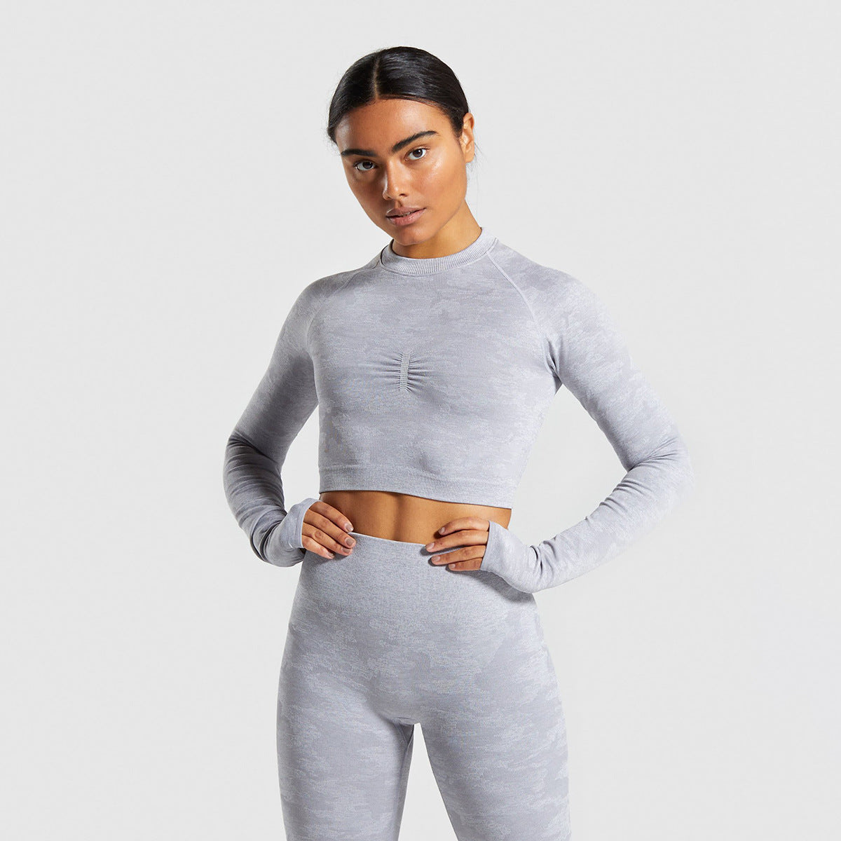 Camouflage Seamless Long Sleeve Workout TopStand out and perform. This camouflage seamless long-sleeve top is built for women who train hard and look good doing it. Made from 90% nylon and 10% spandex, the seActivewear TopBeauty Babeez FitsBeauty Babeez Fits LLCCamouflage Seamless