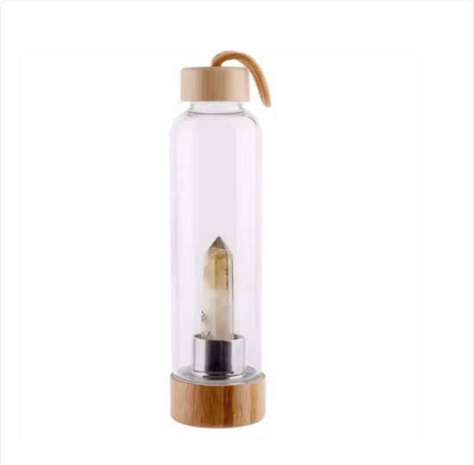 Crystal Bamboo Water BottleElevate your hydration ritual with our Crystal Bamboo Water Bottle. Crafted from durable glass and paired with a genuine healing crystal, this bottle is as beautifulWater BottleBeauty Babeez Fits LLCBeauty Babeez Fits LLCCrystal Bamboo Water Bottle