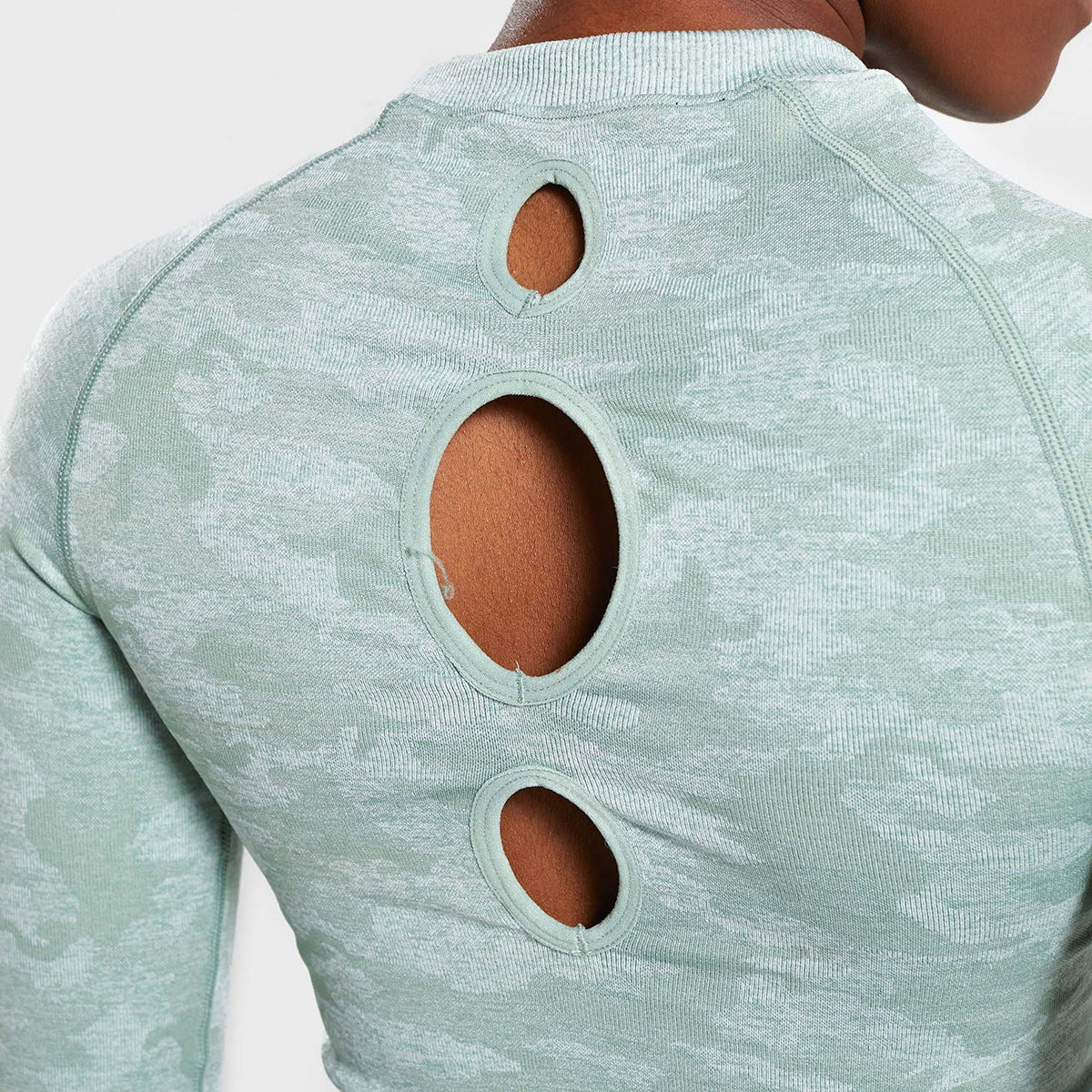 Camouflage Seamless Long Sleeve Workout TopStand out and perform. This camouflage seamless long-sleeve top is built for women who train hard and look good doing it. Made from 90% nylon and 10% spandex, the seActivewear TopBeauty Babeez FitsBeauty Babeez Fits LLCCamouflage Seamless