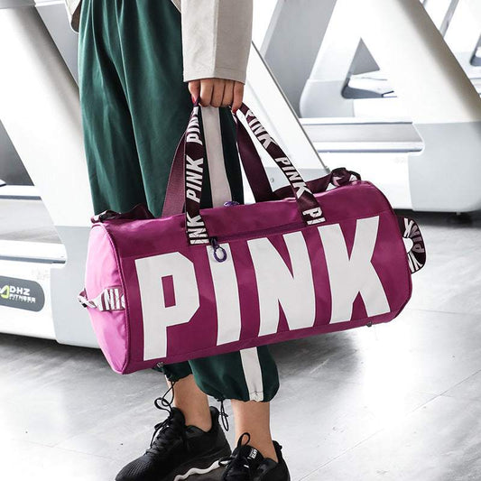 Pink waterproof gym bag with custom logo and large capacity in durable oxford cloth