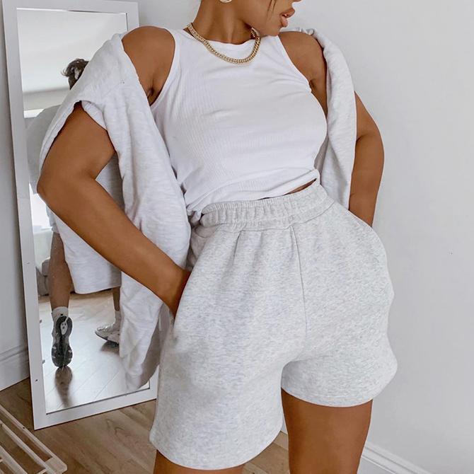 Women's Solid Color Elastic Waist Wide Leg Workout ShortsComfort meets style. These wide-leg workout shorts feature a soft cotton blend fabric and an elastic waist that keeps everything in place — whether you're crushing aShortsBeauty Babeez FitsBeauty Babeez Fits LLCWomen's Solid Color Elastic Waist