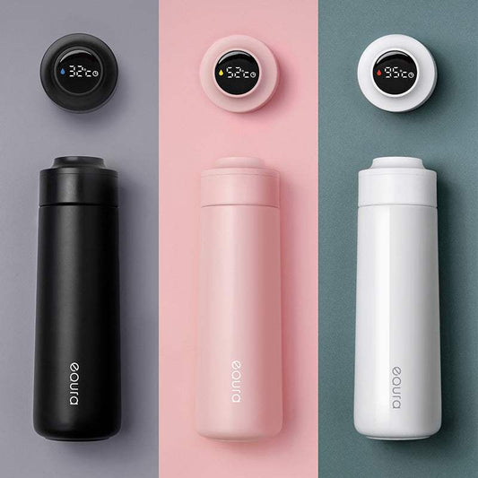 Smart insulated outdoor water bottle in white, black, and pink with USB charging and 400ML capacity