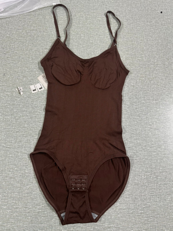 Plus Size Women's Stretch Shapewear BodysuitFlatter your shape with this plus size one-piece shapewear bodysuit. Designed to lift the hips, flatten the belly, and slim the waist, it features comfortable stretcShapewearBeauty Babeez FitsBeauty Babeez Fits LLCPlus Size Women's