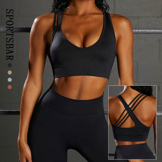 woman wearing seamless knit sports bra and high-waist yoga pants in black